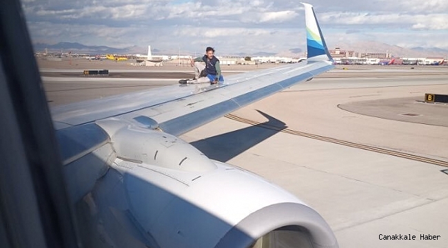 ABD&#039;de bir kişi kalkış yapmaya hazırlanan uçağın kanadına tırmandı