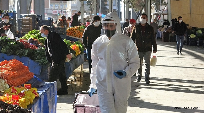 Böyle tedbir görülmedi, tulumla pazara girdi