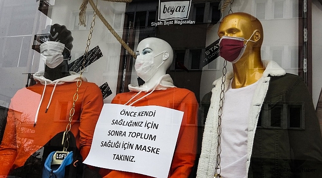 Cansız mankene maskeli Covid-19 önlemi