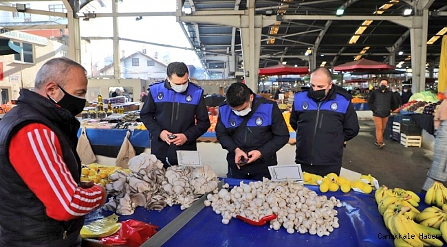 Ekipler pazarda HES kodu ve ateş ölçümü yaptı