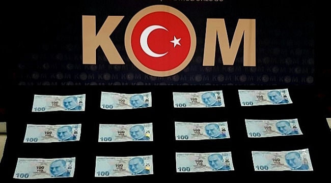 Pazarda sahte parayla alışveriş yaparken yakalandılar