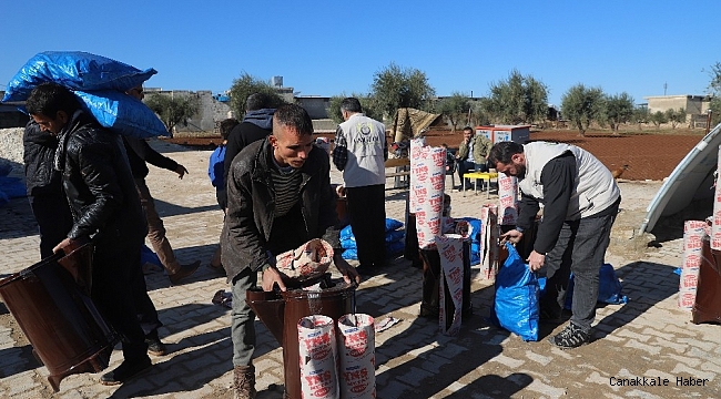 Suriyelilere yakacak yardımı