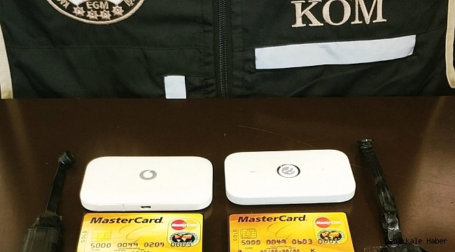 Ehliyet sınavında kamera, kulaklık, wifi sisteminden oluşan düzenekle yakalandılar