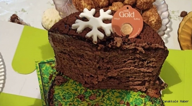 Yılbaşı pastasından altın çıktı, şaşkına döndü