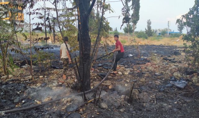 Boş arazide çıkan yangın paniğe yol açtı