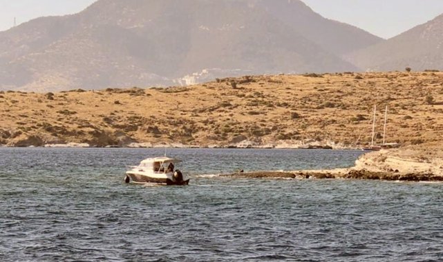 Kayalıklara oturan tekneyi Kıyı Emniyet kurtardı