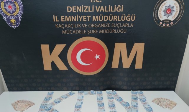 Sahte paraya orijinal hissi vermek için mum kullanmışlar