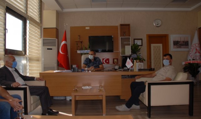 MHP&#039;den Başhekim Yavuzer&#039;e hayırlı olsun ziyareti