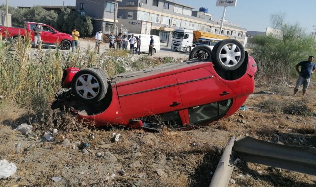 Takla atan otomobilin sürücüsü yaralı kurtuldu