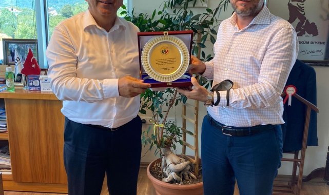 TSO Başkanı Keleş&#039;ten Tatoğlu&#039;na plaket