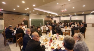 Muhtarlarla iftar yaptı