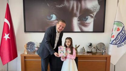 Başkan Öztürk’ten okul birincisine tebrik